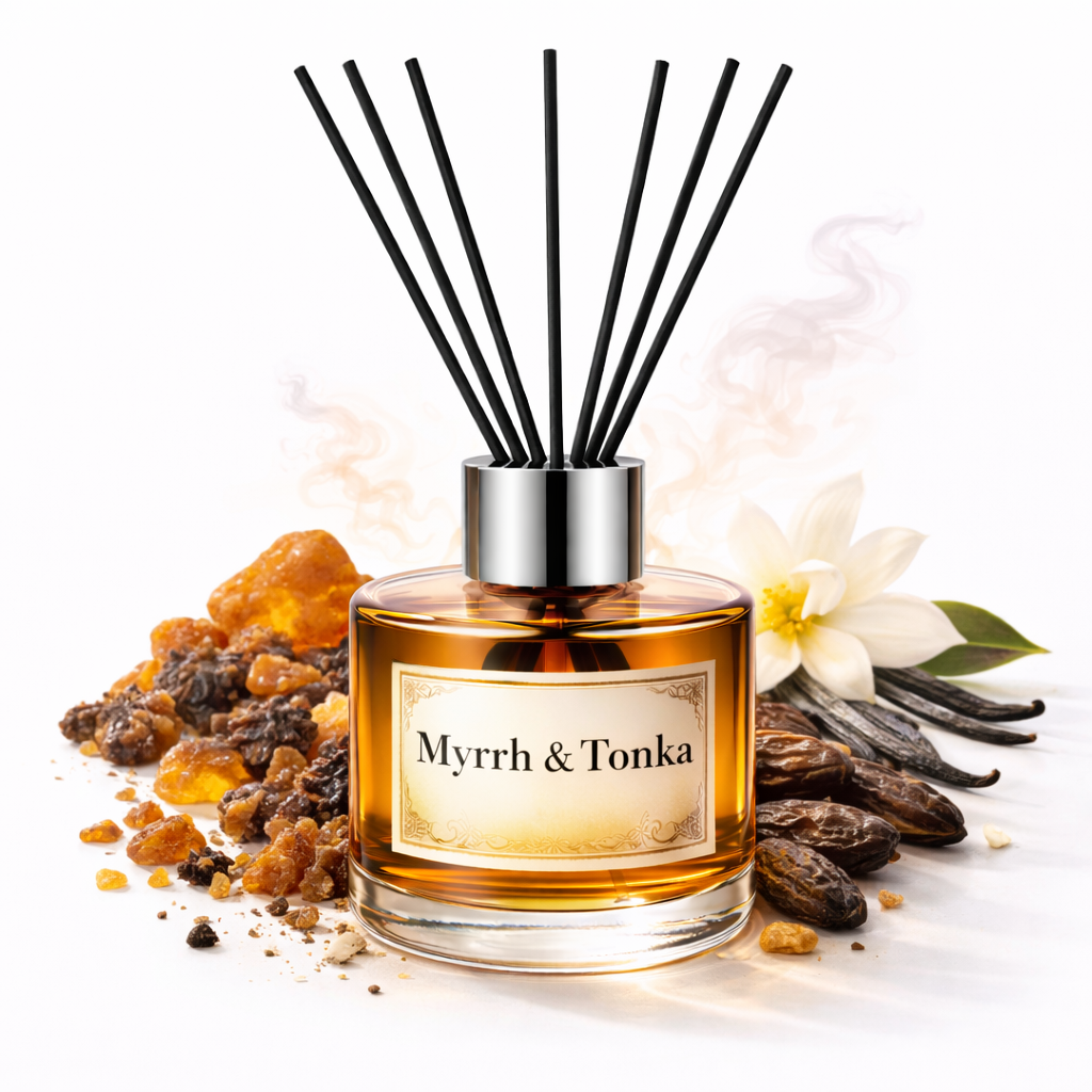Reed diffuser labeled 'Myrrh & Tonka' with ingredients on a white background