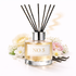 NO 5 Reed Diffuser Oil with flowers, vanilla pods on white background