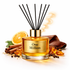 Reed diffuser labeled 'One Million' with cinnamon sticks, orange, and amber on a white background