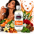 A bottle of Fizzy Whiz Opium Fragrance Oil centered in a styled composition with a woman holding a perfume bottle in the background, surrounded by citrus, flowers, greenery, and an orange liquid splash on a white backdrop.