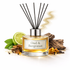 Reed diffuser labeled 'Oud & Bergranat' with decorative elements on a white background
