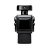 Glossy black square perfume-style bottle with a wide rectangular cap and sculpted side details, displayed upright on a plain light background.