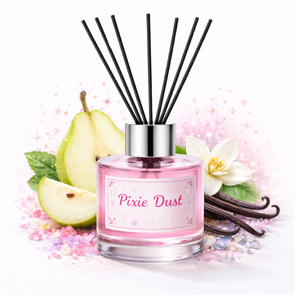 Pink diffuser bottle labeled 'Pixie Dust' with black sticks, pear slices, vanilla beans, and flowers on a white background.