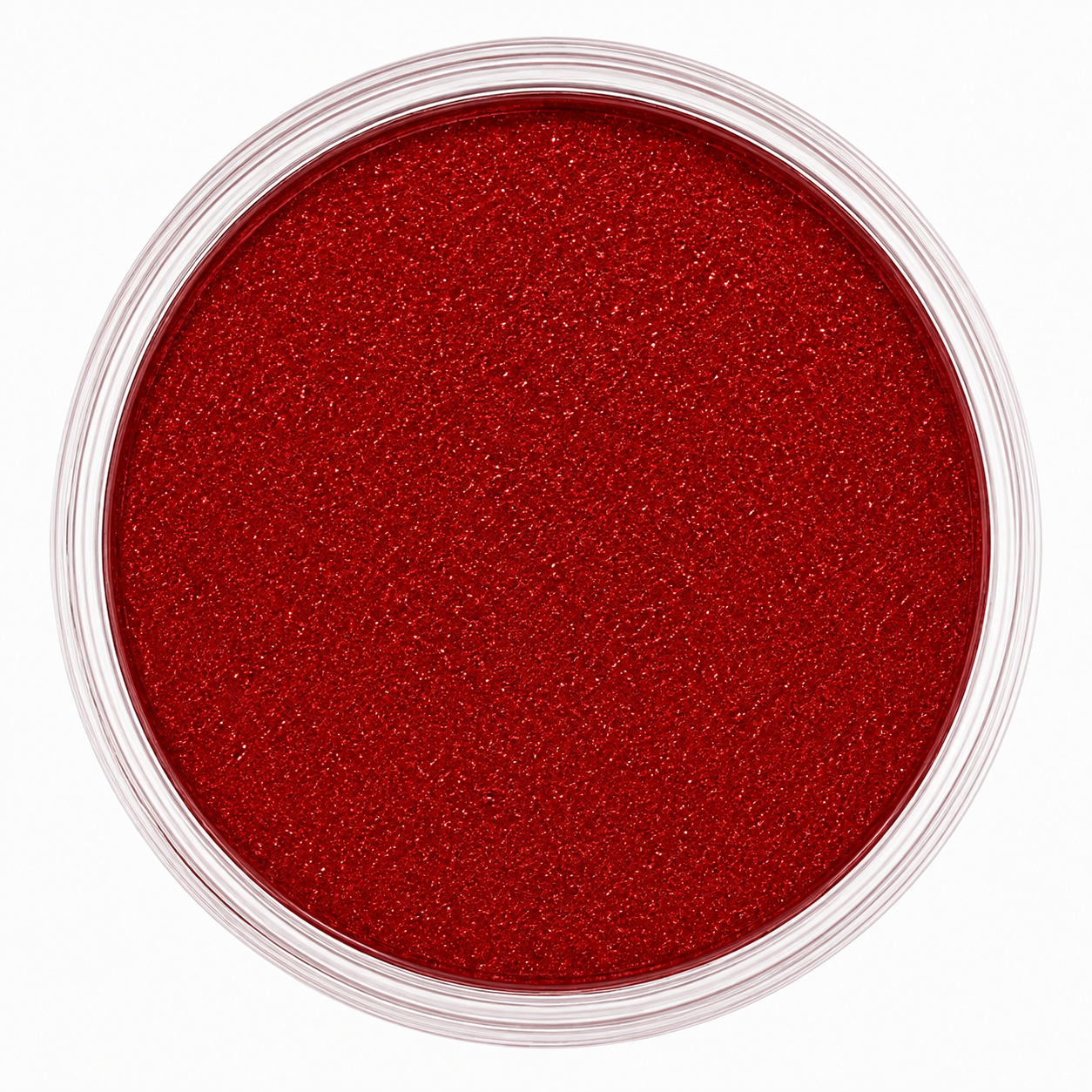 A top-down view of a clear round plastic jar filled with vibrant red glitter, set against a solid white background.