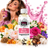 A bottle of Fizzy Whiz Rose Royale Fragrance Oil is centered, surrounded by roses, peaches, oranges, pears, vanilla, chocolates, and a woman holding a perfume bottle in the background with pink liquid splashes and droplets on a white backdrop.