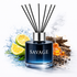 Savage diffuser with lemons, cinnamon sticks, and spices on a white background