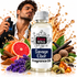 A bottle of Fizzy Whiz Savage Elixir Fragrance Oil centered in front of a man spraying perfume, surrounded by citrus, lavender, cinnamon, spices, and a golden liquid splash on a white background.