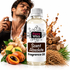 A bottle of Fizzy Whiz Scent Absolute Fragrance Oil centered in the foreground, with a man holding a perfume spray in the background, plus ginger, fruit, roots, and liquid splash graphics around it on a white studio background.