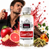 A bottle of Fizzy Whiz Scent Elixir Fragrance Oil centered on a white background, surrounded by fragrance ingredients including red berries, an apple, citrus, cardamom pods, and flowers. A man in a black shirt holds a red perfume bottle in the upper left, with red liquid splashes behind the main bottle.
