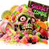 A Halloween-themed zombie skull surrounded by colorful candy, gummy worms, sliced citrus, strawberries, and spilled pink sugar, with a sign reading “SHERBET ZOMBIE” on a white background.