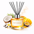 Reed diffuser labeled 'Sol Cabana' with tropical fruits and coconut on a white background