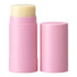 A pink lip balm stick with its cap removed, showing a pale yellow balm stick, alongside the separate pink cap on a plain white background.