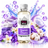 A bottle of Fizzy Whiz 'Spanish Dreams' fragrance oil centered against a white background, surrounded by decorative purple and lavender-themed props including flowers, cotton bolls, feathers, purple silk, bubbles, and a crescent moon.
