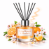 Spring Blossom & Mandarin  Reed Diffuser Oil with oranges leaves and flowers on white background 