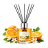 Reed diffuser with sweet orange fragrance surrounded by oranges and flowers on a white background
