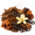 A styled botanical blend of warm spices and ingredients on a white background, including dark brown tobacco leaves, vanilla beans, amber sugar cubes, caramel pieces, cinnamon sticks, star anise, cloves, and a pale yellow vanilla orchid flower.