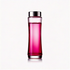 A tall, slender bottle with a clear to pink gradient, containing pink fragrance oil.