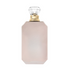 Perfume bottle with a pinkish-beige body and gold cap on a white background