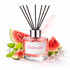 Reed diffuser labeled 'Watermelon' with watermelon slices and mint leaves on a white background