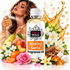 A bottle of Fizzy Whiz Wedding Santal Fragrance Oil centered in front of a woman spraying perfume, surrounded by flowers, fruit, vanilla pods, and a gold splash graphic on a white background.