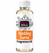 A bottle of Fizzy Whiz Wedding Santal Fragrance Oil on a plain white background. The bottle is made of clear glass showing the pale yellow liquid inside, has a white ribbed cap, and a white label with black text and graphics, featuring an orange block that reads 'Wedding Santal'.