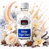 A bottle of Fizzy Whiz Winter Night Stars Fragrance Oil centered against a festive, snowy background decorated with white flowers, vanilla beans, star anise, a crescent moon, and gold stars.