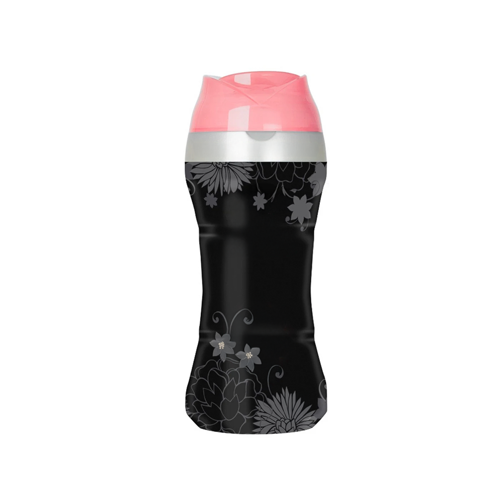 A black bottle with a floral pattern and a pink cap labeled 'Bliss'