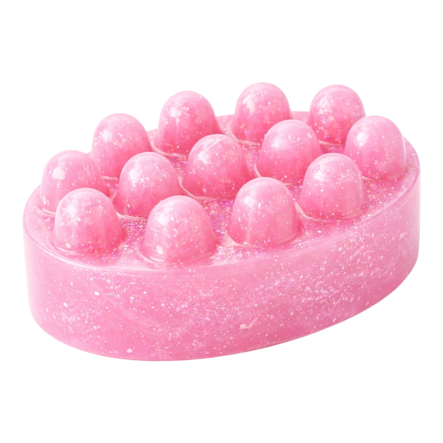 Pink soap with embedded pink beads on a white background