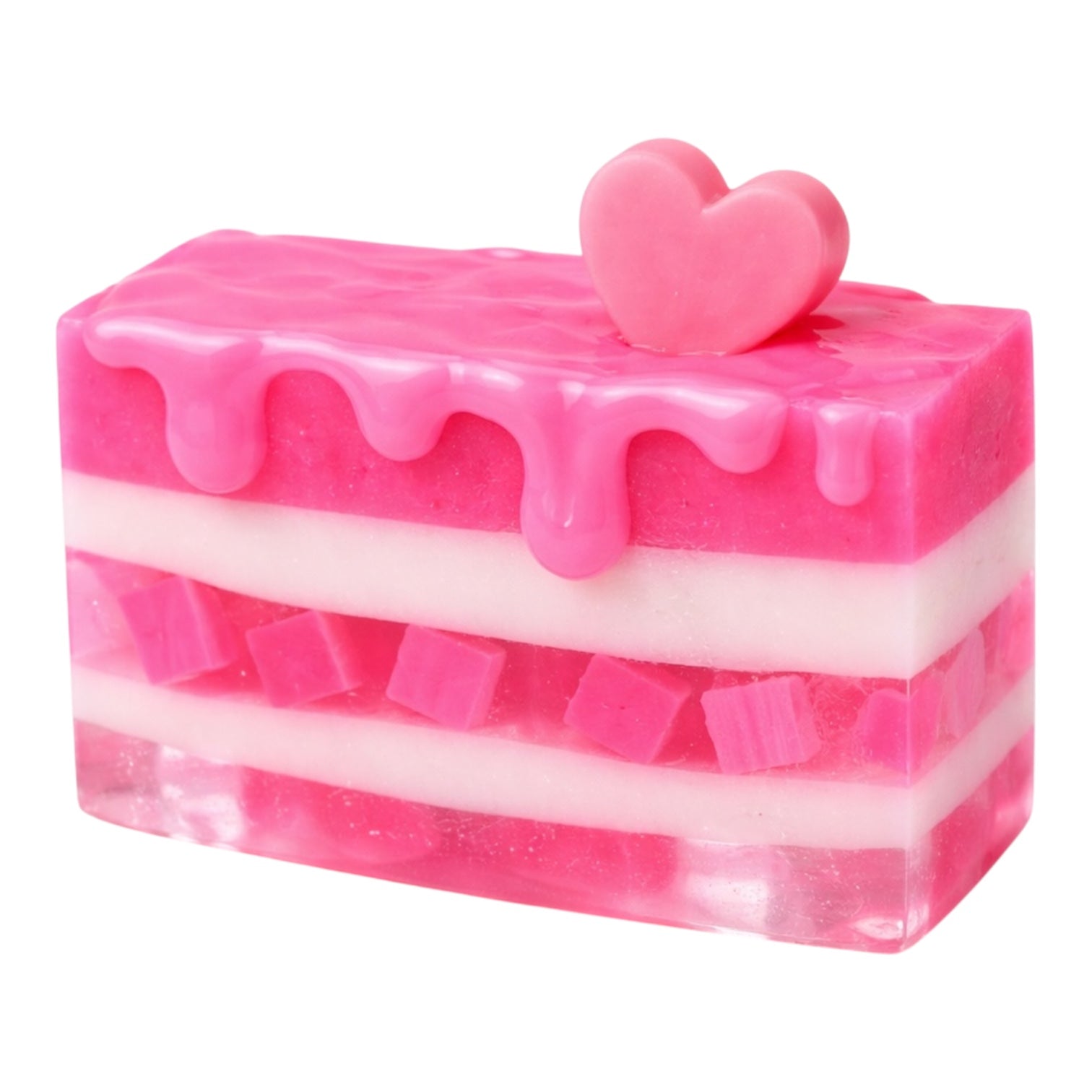 Pink layered cake-shaped soap with a heart on top against a white background